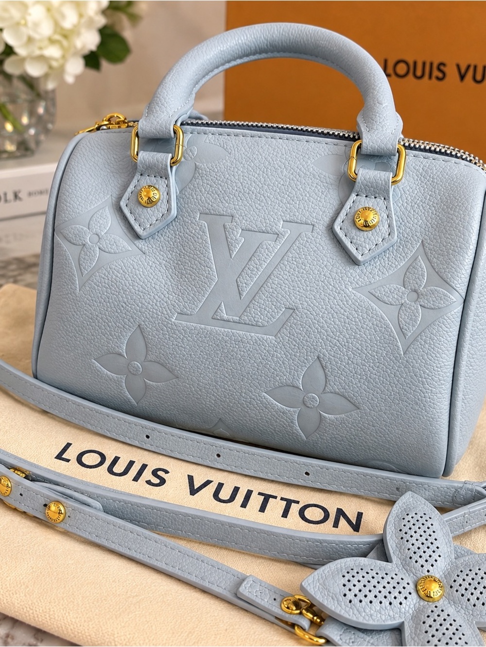 Light Blue Embossed Monogram Crossbody Bag